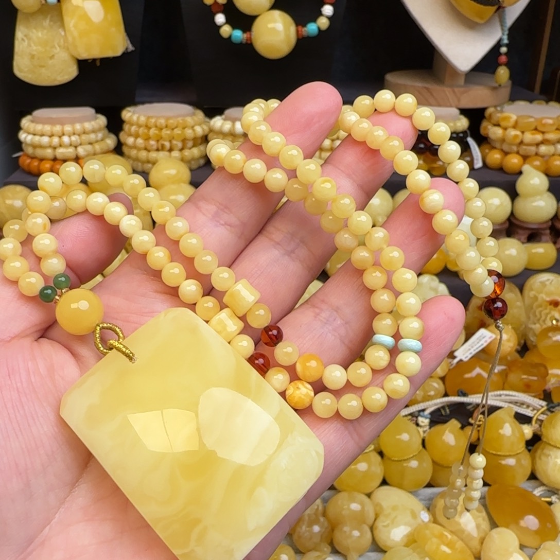 琥珀未镶嵌套链天然溶洞妖花蜜蜡无事牌吊坠