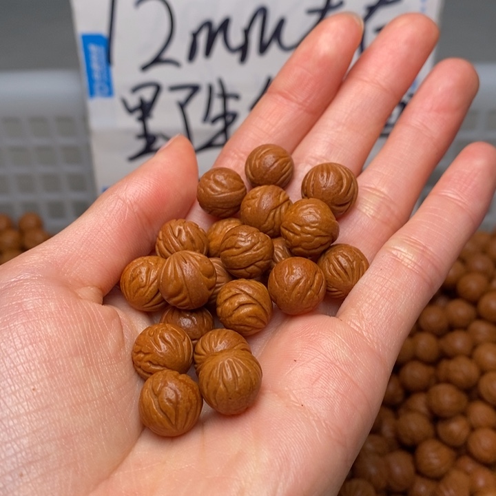 用***0桃核手串11mm左右野生红锦鲤22颗（打孔）