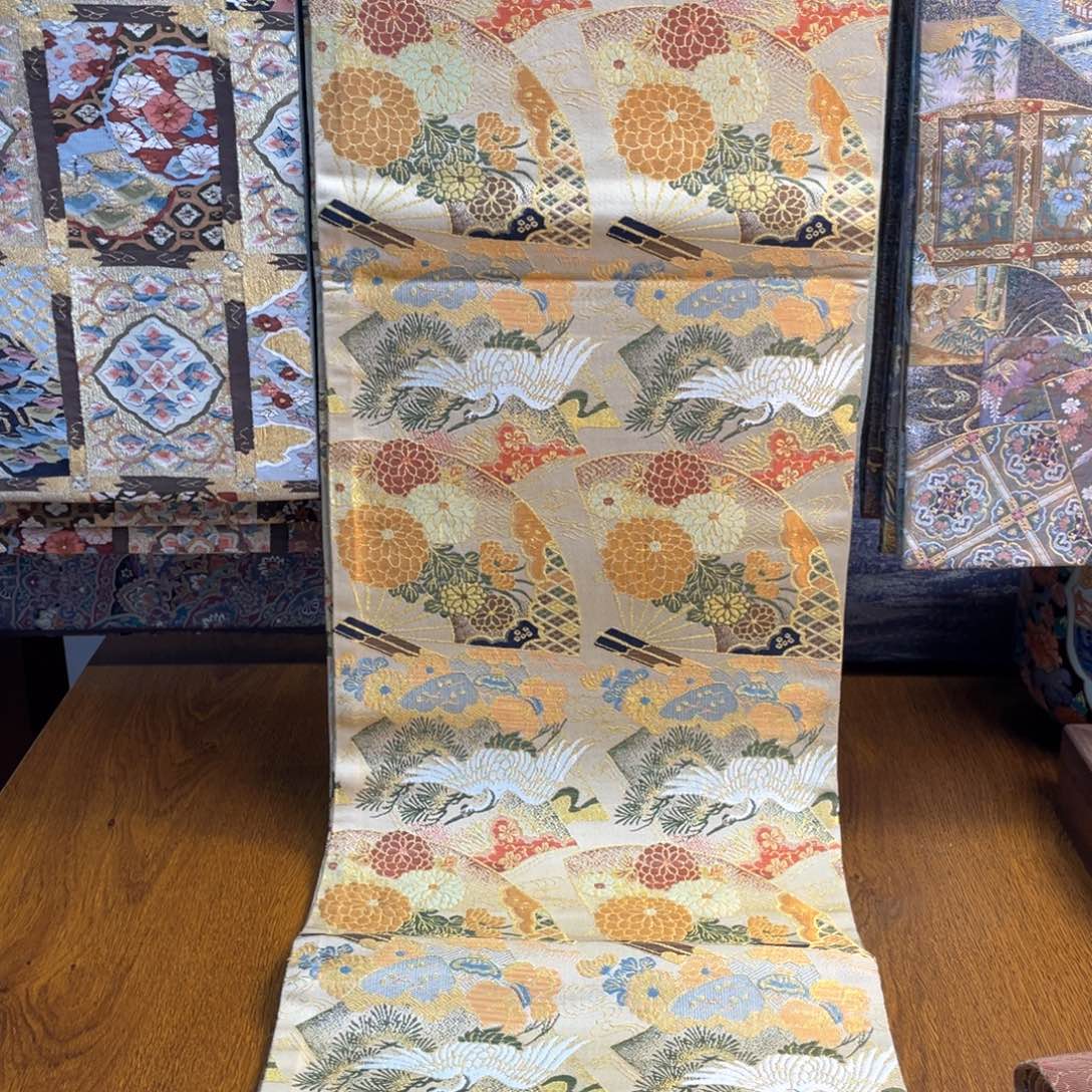 织绣双面全通老丸带