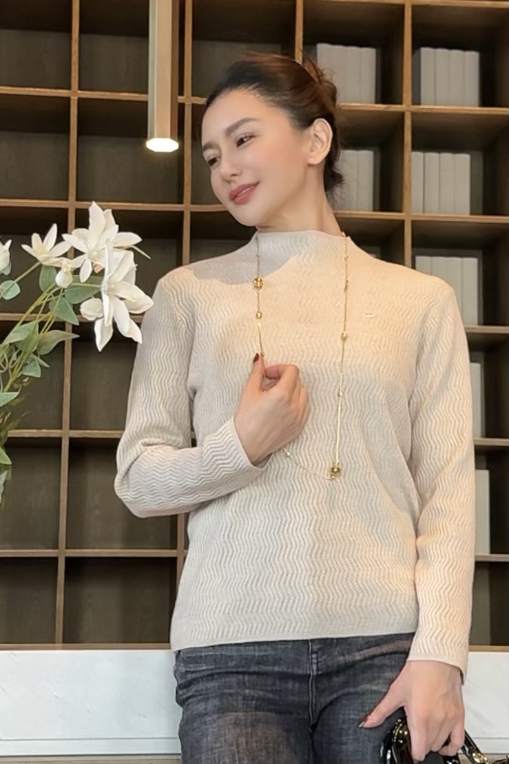 秋冬新款女士针织羊毛衫中高领宽松显瘦百搭