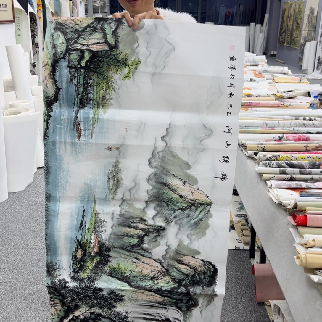 国画卖字画的小男孩