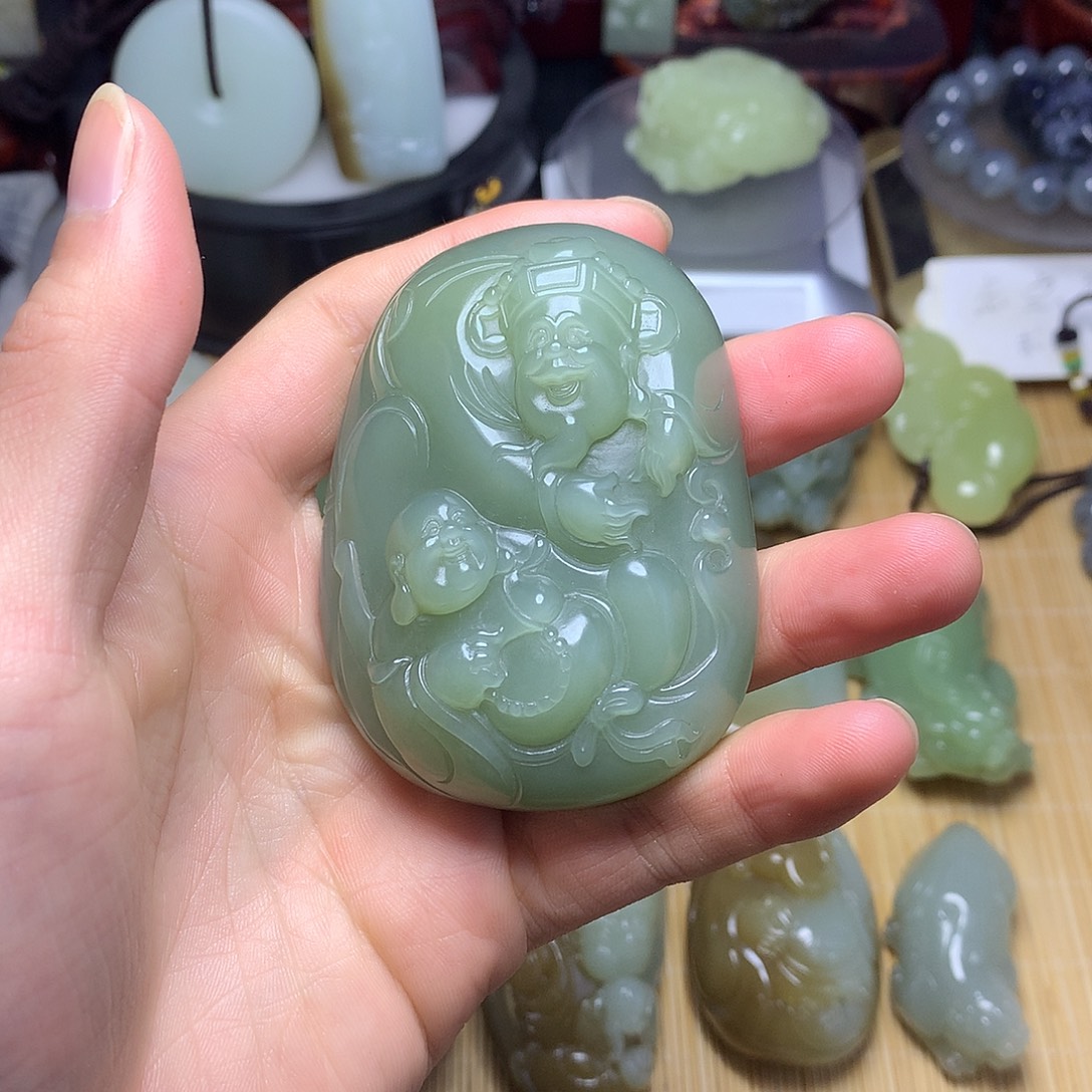 杨***平和田玉未镶嵌把件