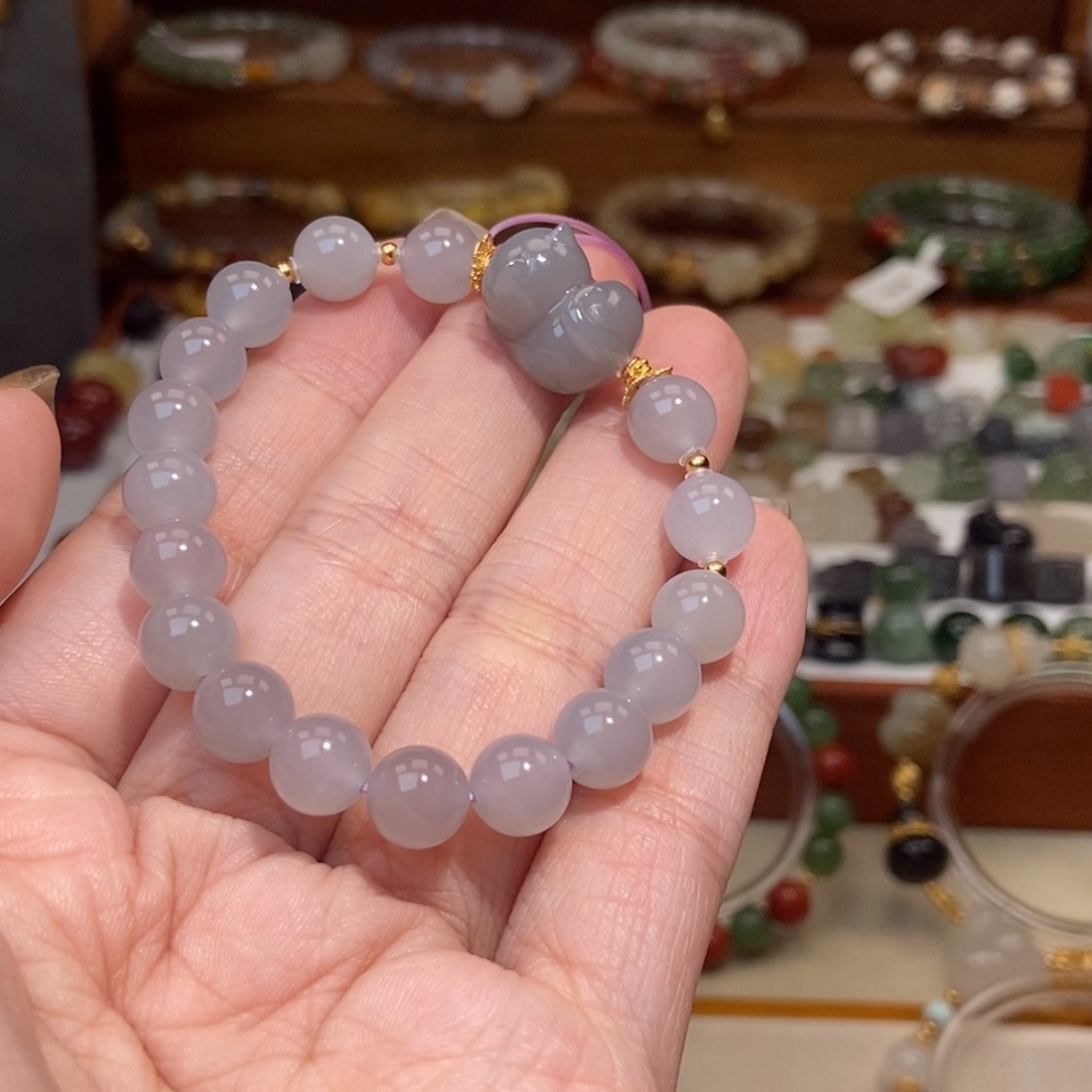 暖****和田玉银S925镶嵌手串烟紫猫单圈