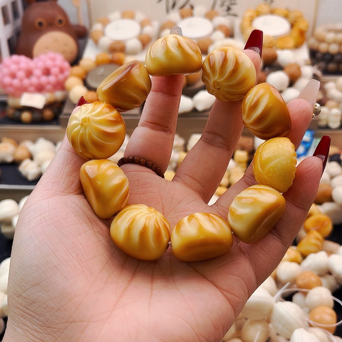 菩提根/象牙果手串奶***?元宵/包子