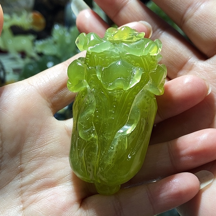 蛇纹石玉手把件合金