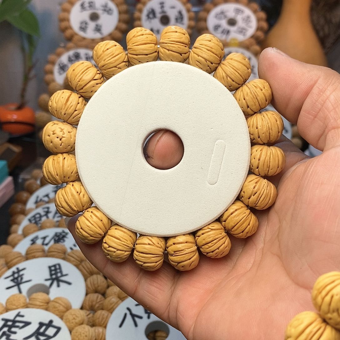 【闪购商品】F**蟹桃核手串纽扣手串