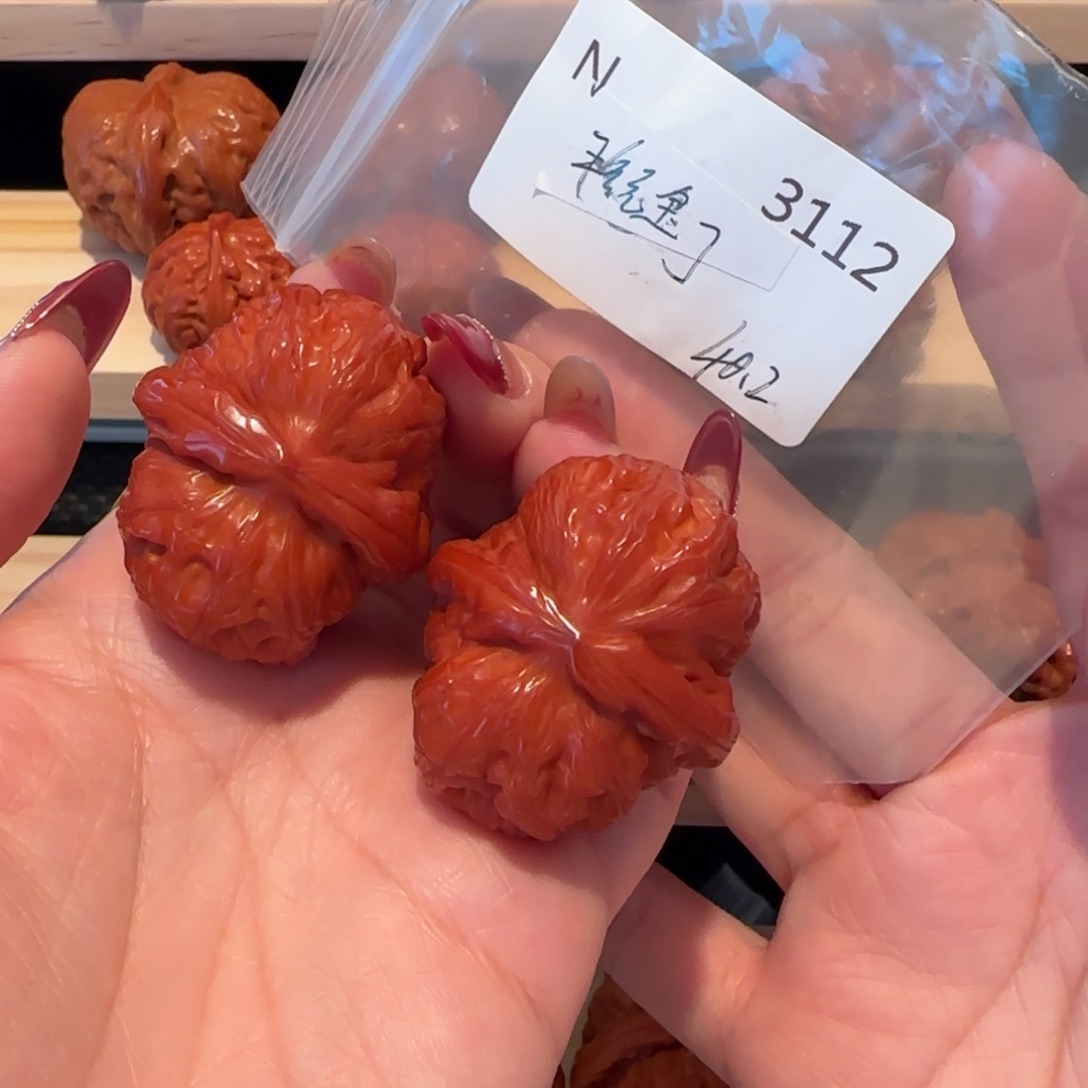 生***洱文玩核桃吊坠玉化元宝40精品