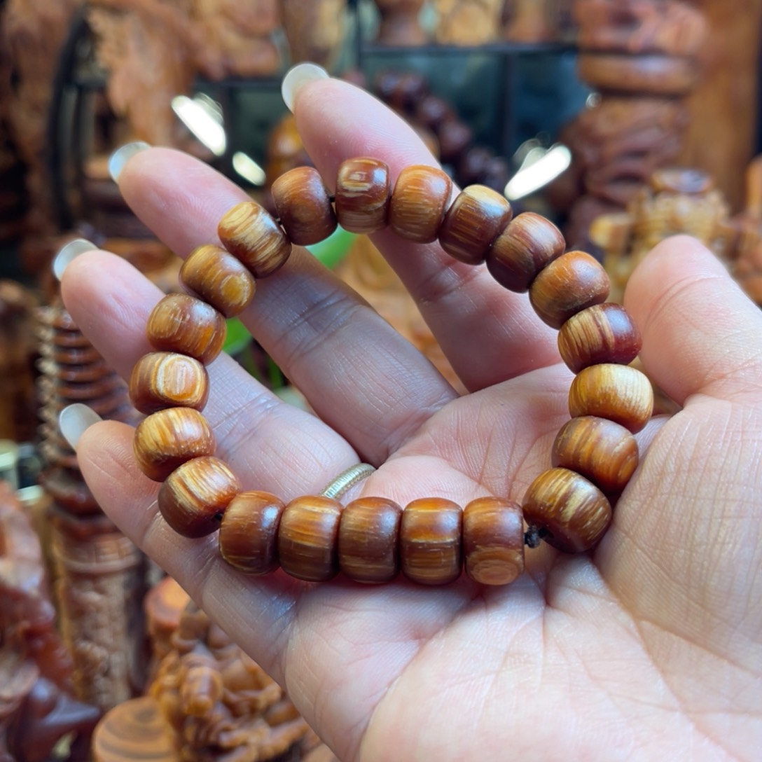 其他松木（琥珀木）瑕1.3苹果圆手串