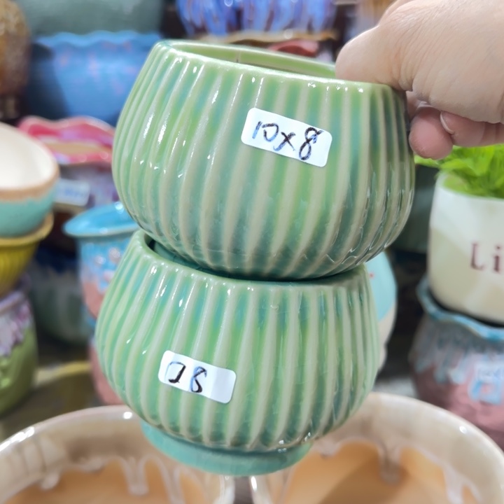 凑9块包邮，有孔，陶瓷花盆