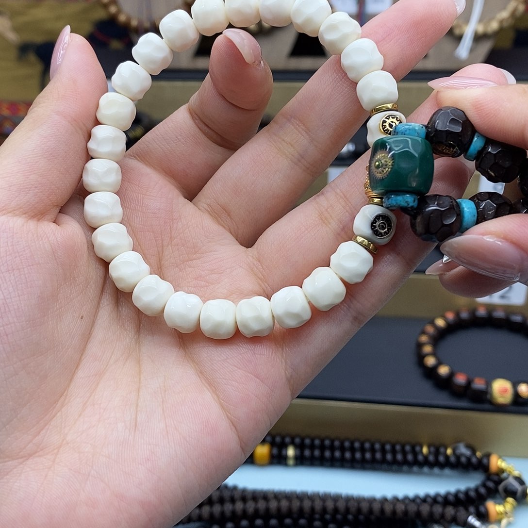 浮***夸椰蒂手串9*8换顶珠