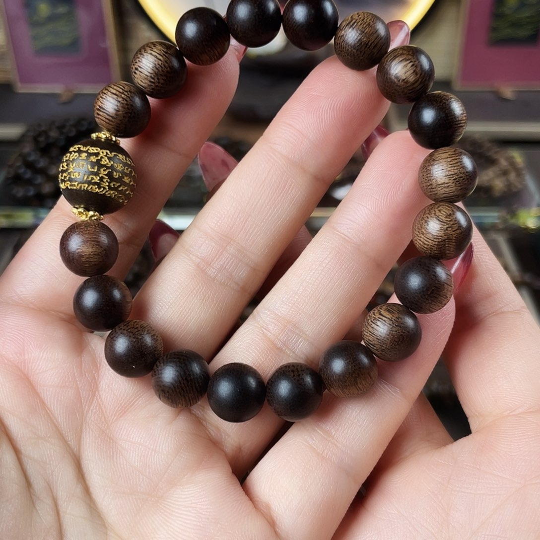 锦***一手串沉香越南富森红土玉化老料瘤疤1.0