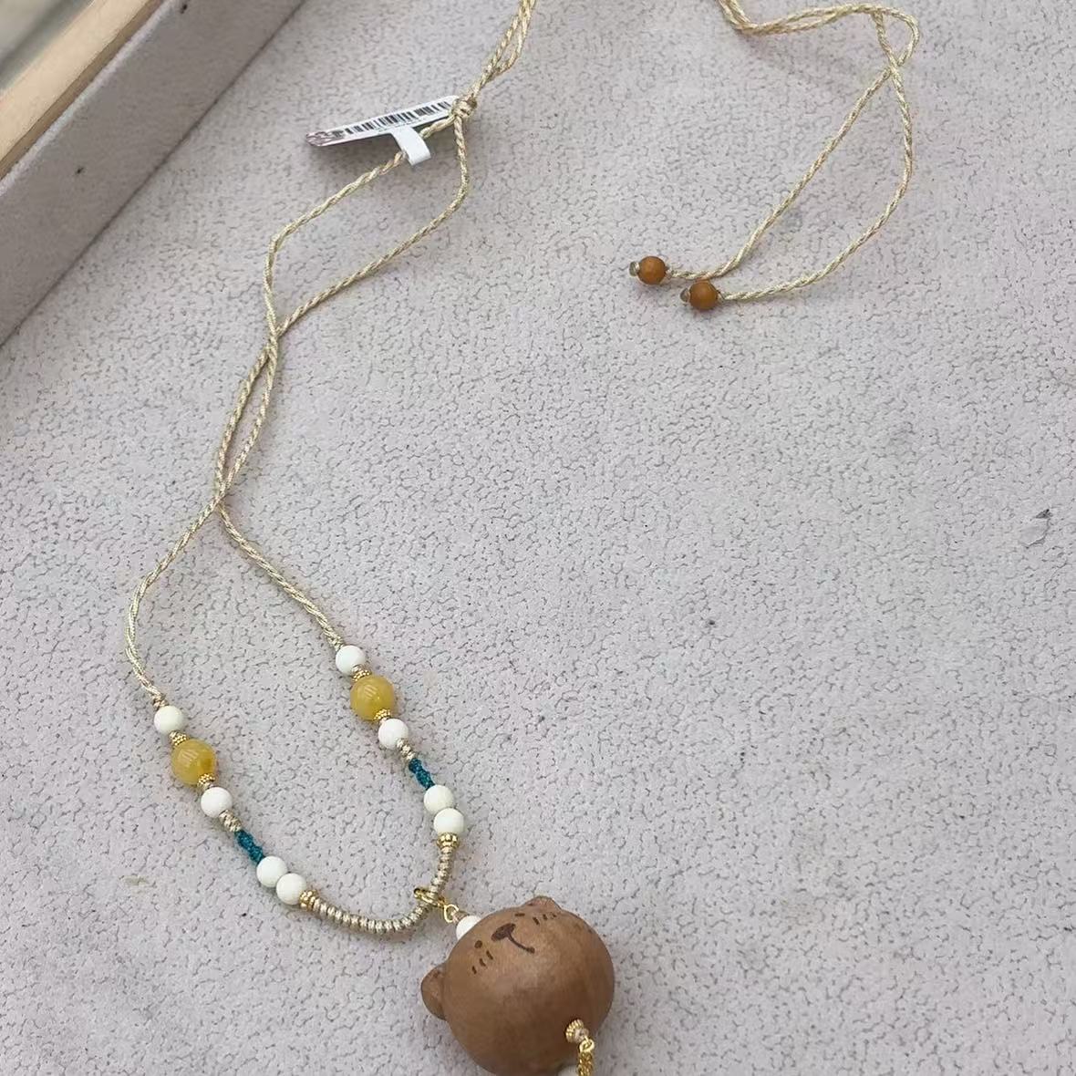 檀檀小熊猛犸牙编绳项链