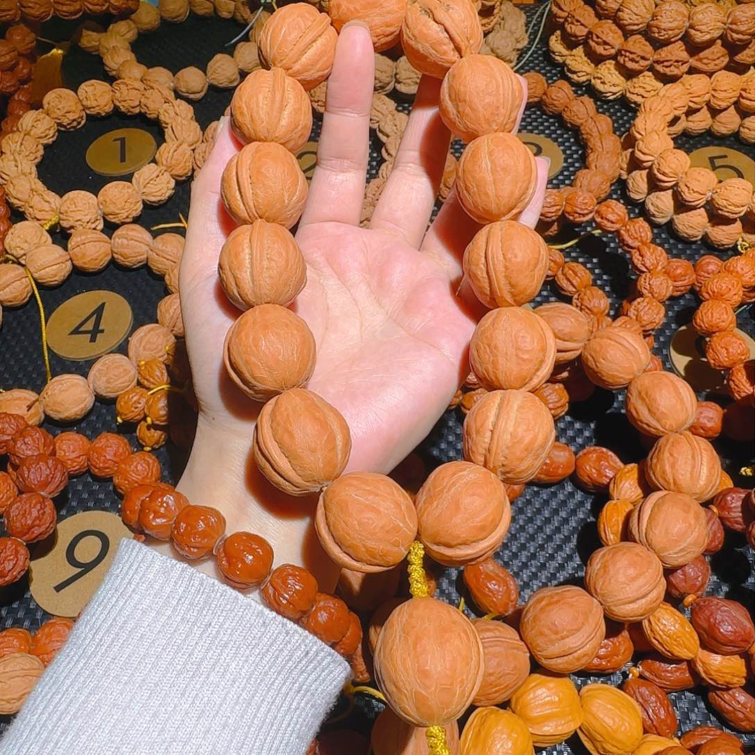 灰*儿文玩核桃吊坠舍利手持白茬