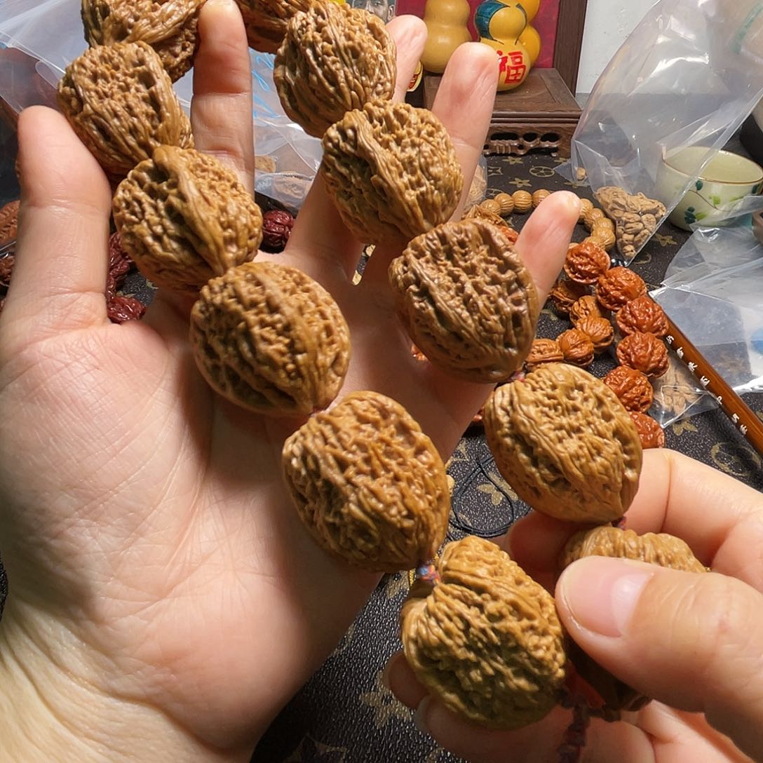 咖***豆核桃南疆石拉丝纹手持