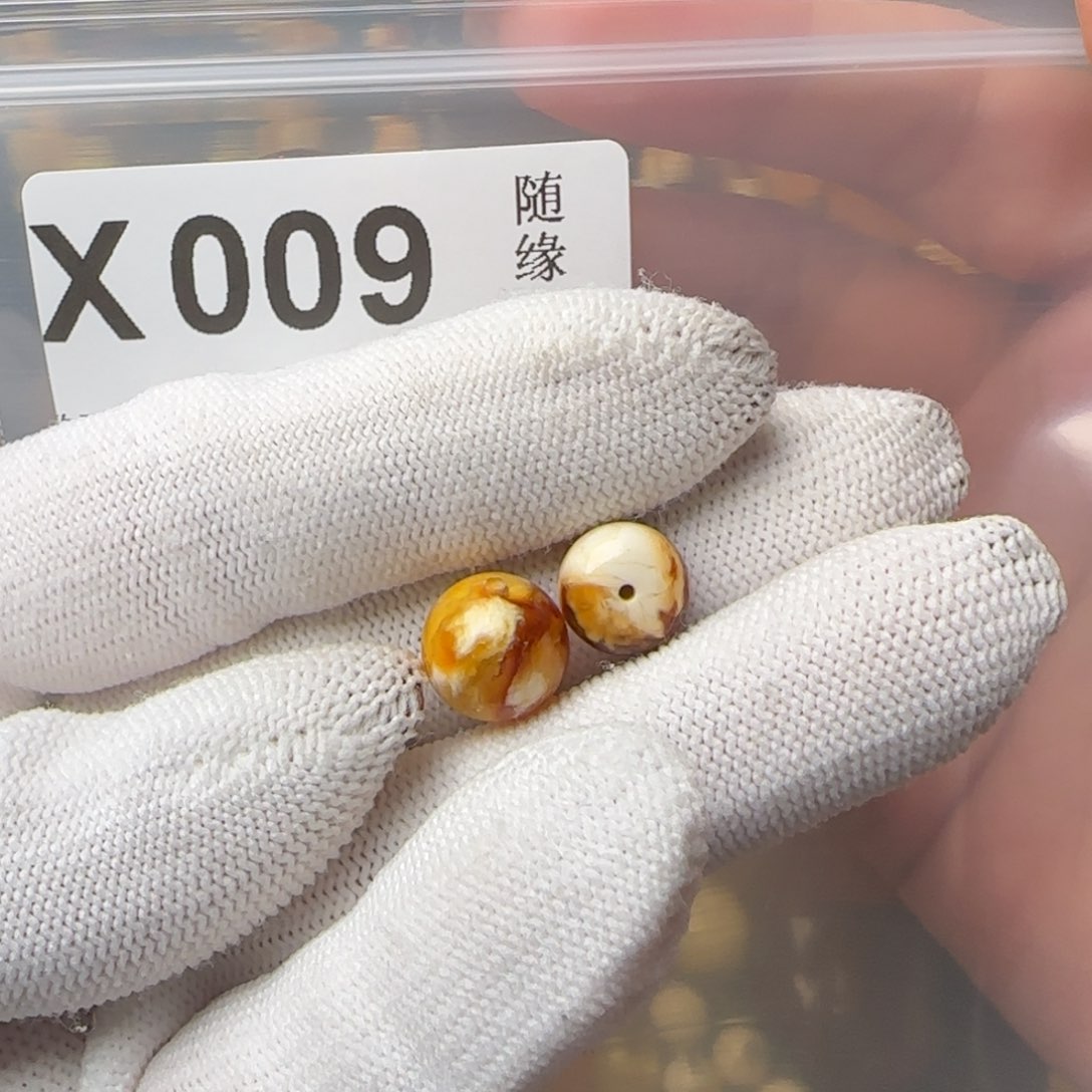 琥珀裸石未镶嵌吹****?圆珠