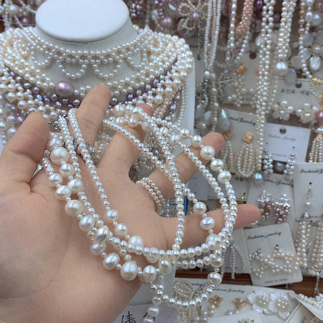 小***子银S925镶嵌耳饰淡水珍珠