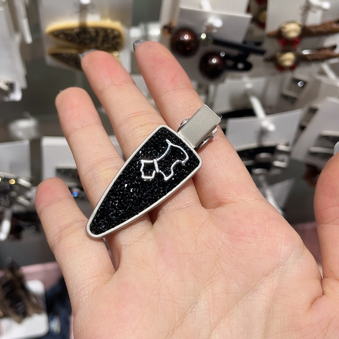 羽毛非金属黑色砂糖狗一只