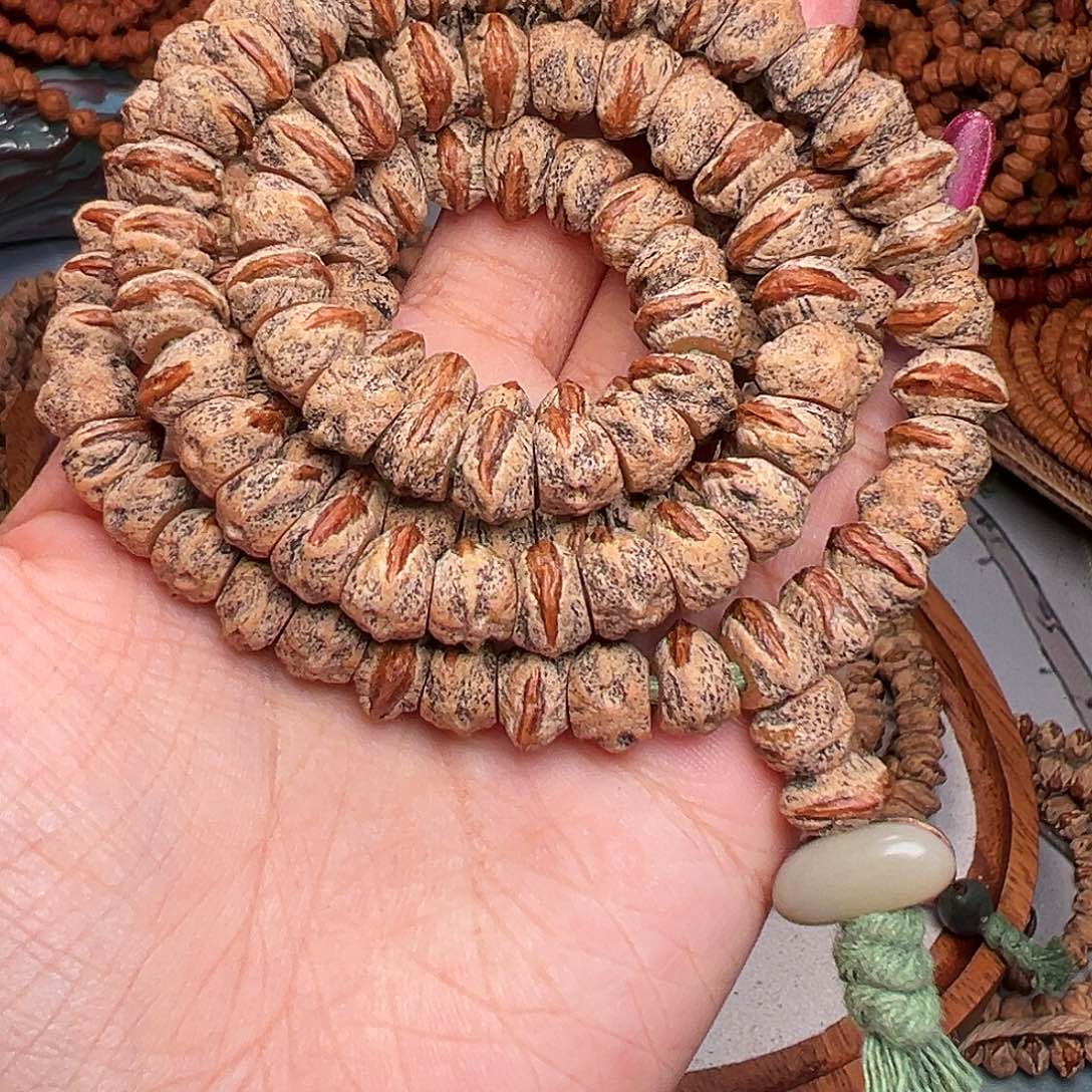 杨***有柏香籽/百香籽吊坠