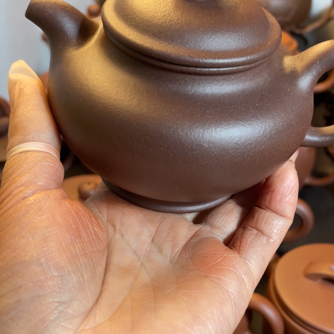 春***水茶壶紫砂多子壶。 