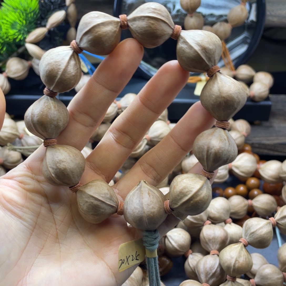 明***空橄榄核吊坠2025铁核