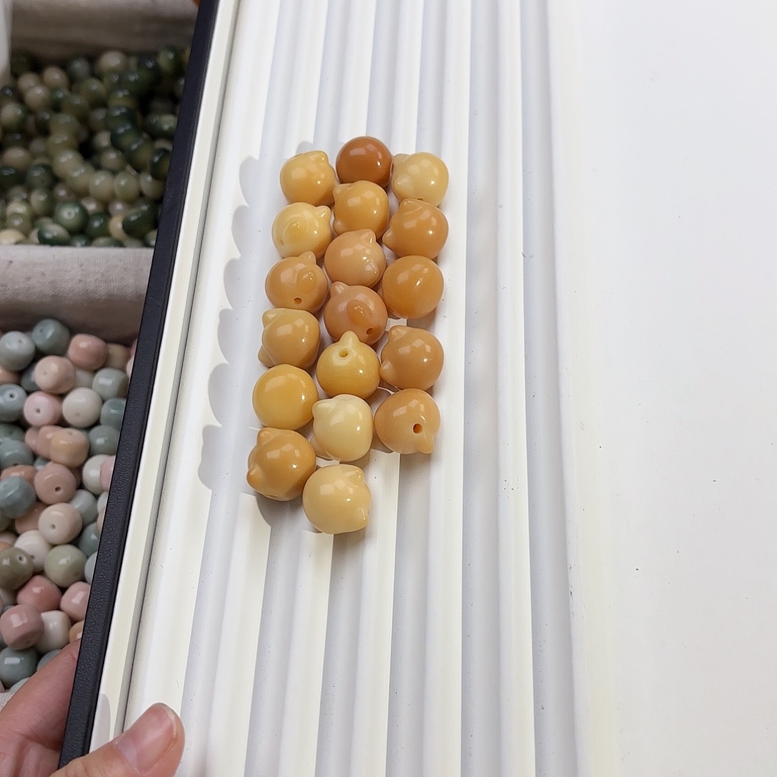 菩提根/象牙果手串?****仙猫头18颗默认微瑕