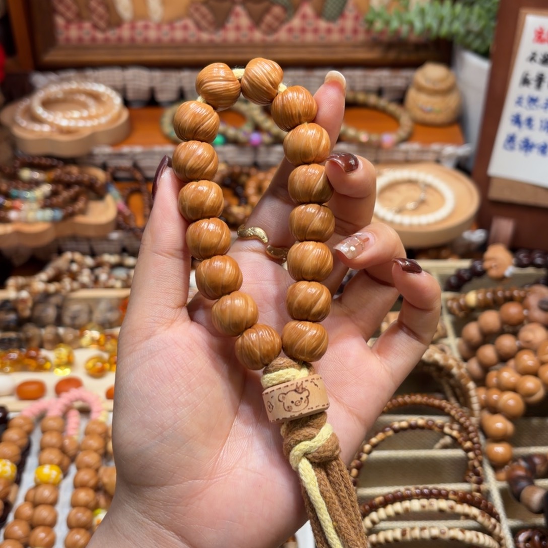 懿***希库克吊坠卷卷酥手持