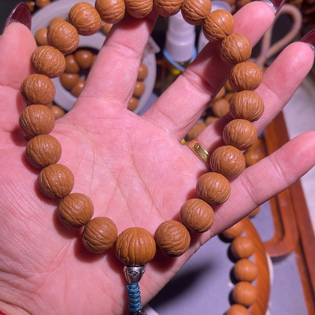 领***悟吊坠猴头核桃凤羽手持