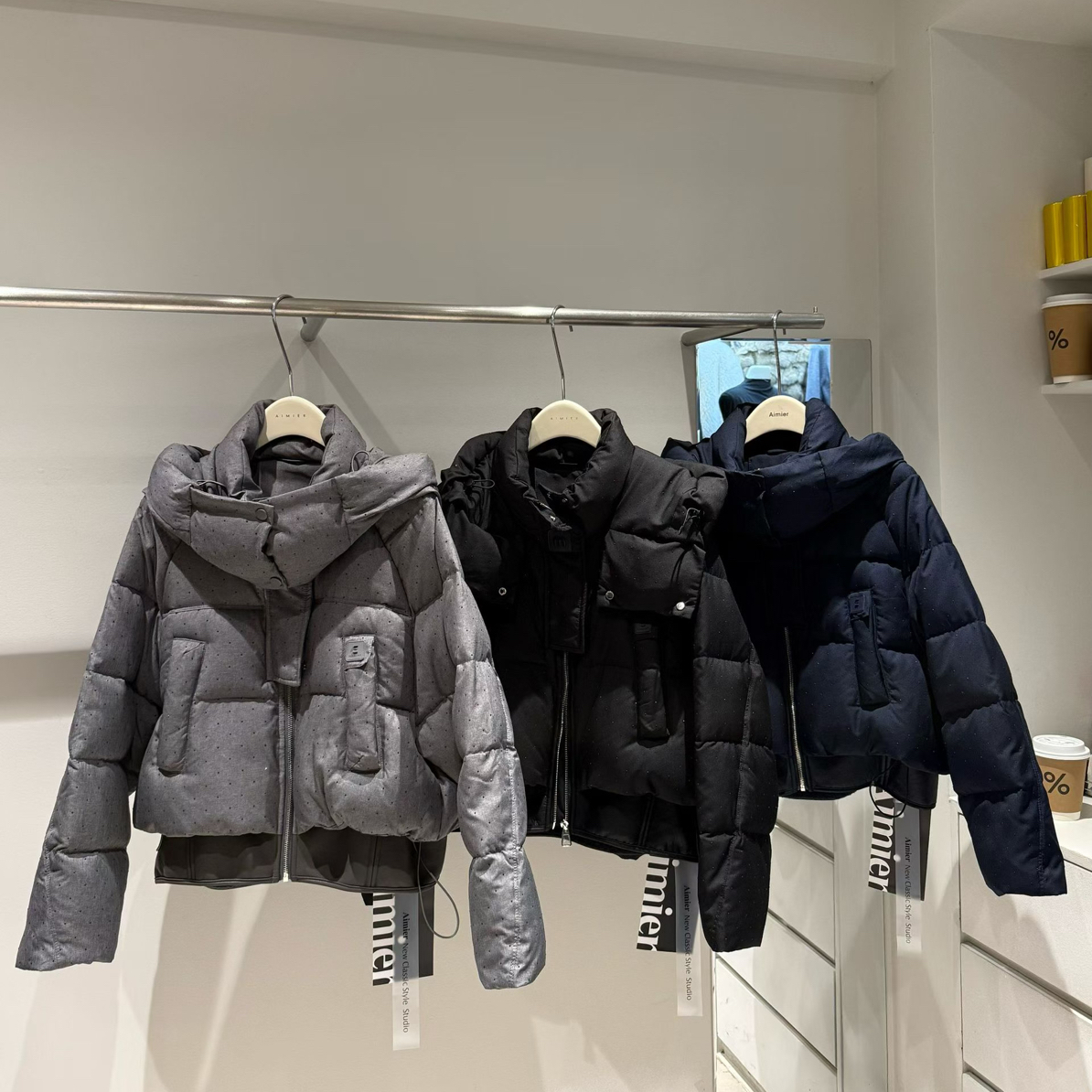 宁夫人家实体店亮钻加厚羽绒服