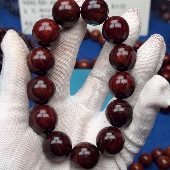 用***7花梨木类红降18圆珠红肉满油单圈（瑕疵）