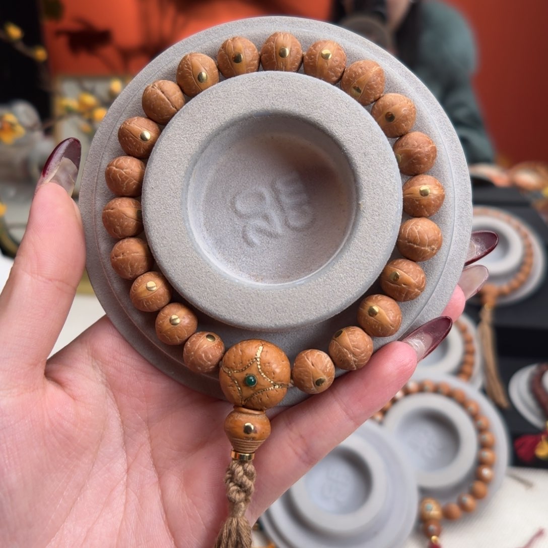 凤眼菩提手串11.5mm铁籽单圈麒麟眼铜钉