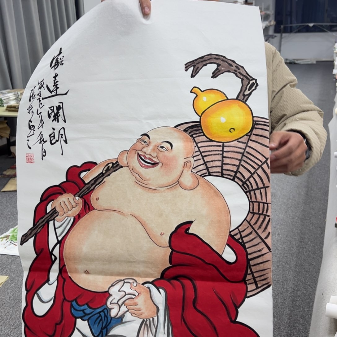 国画卖字画的小男孩