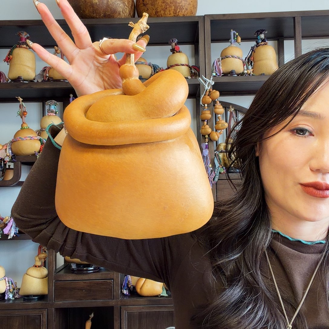 夏***a老皮挽结钱袋子葫芦摆件