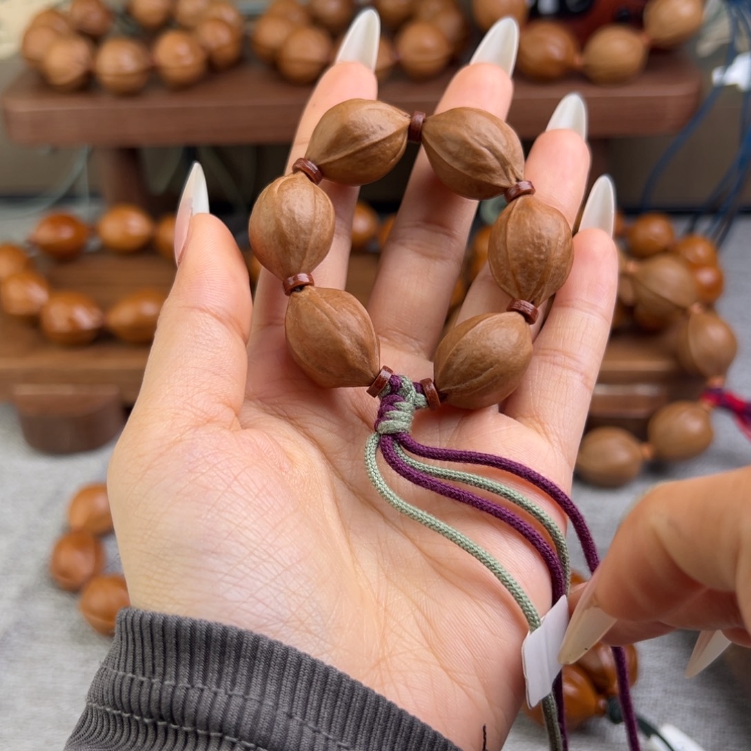 看***树橄榄核手串17/24 三花梅林铁核小手捻