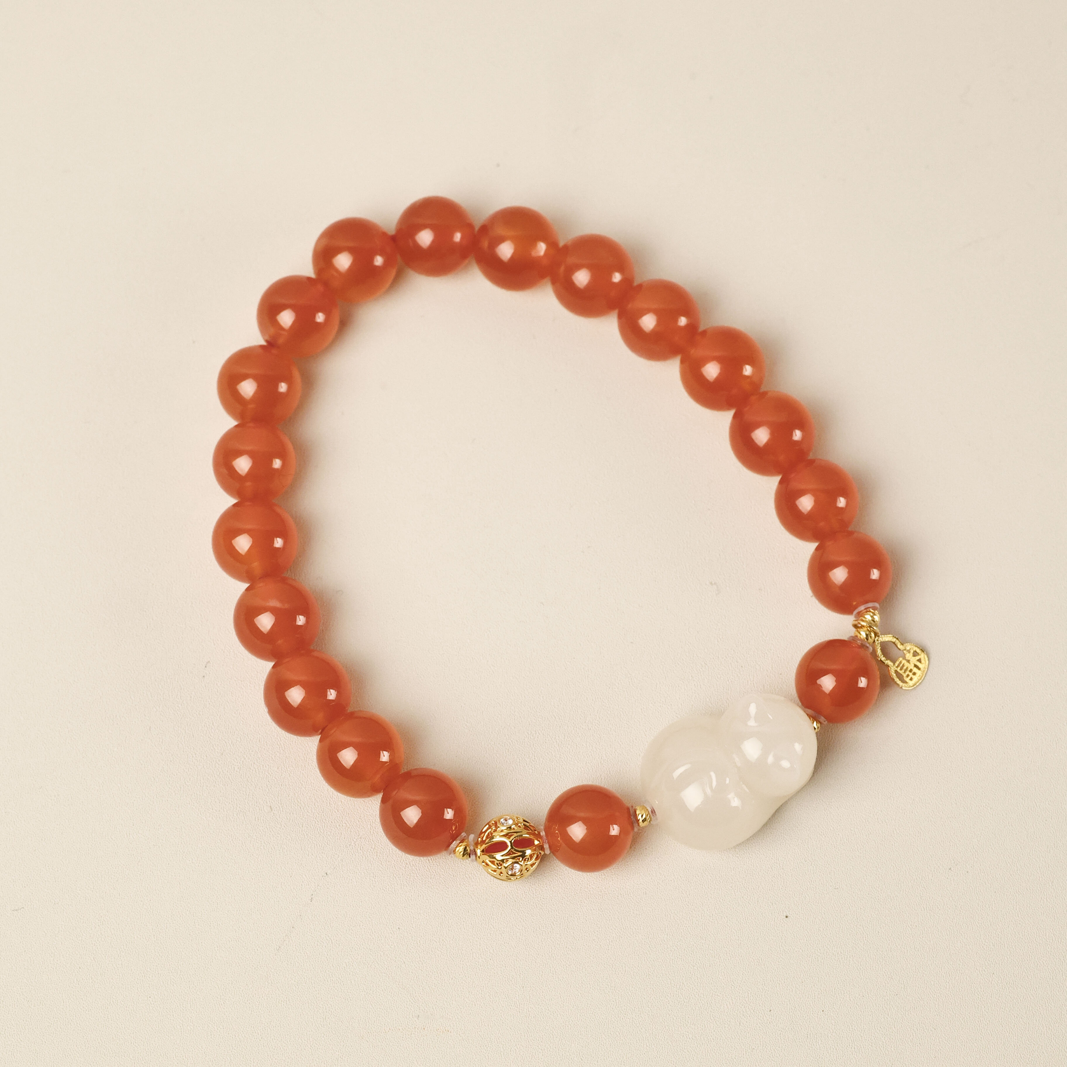 【玉福珠宝】18k金南红保山料藕粉猫猫手串-S3941-华