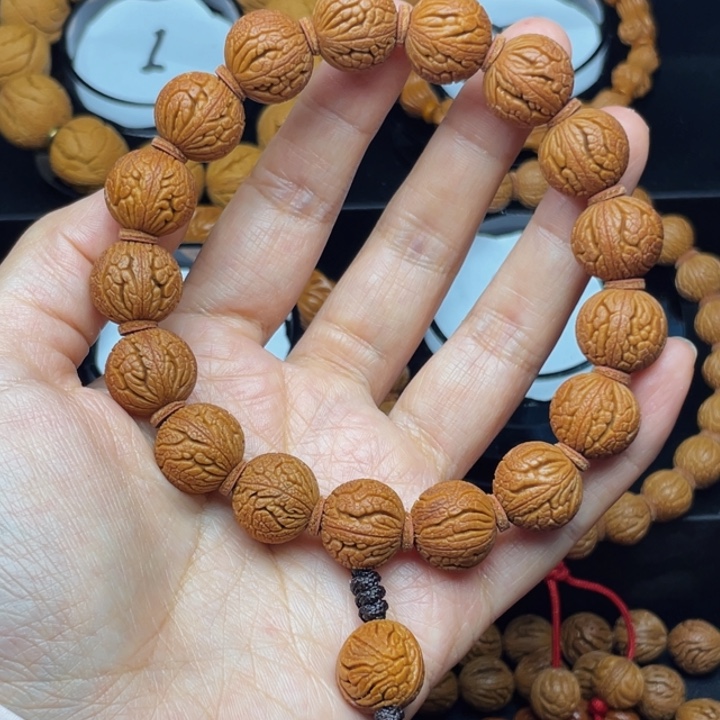 曺***曹桃核吊坠龙鳞仿古