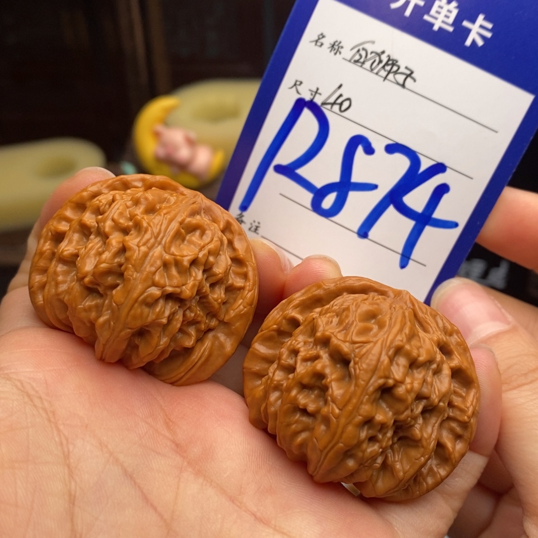 佳***_文玩核桃吊坠白狮子