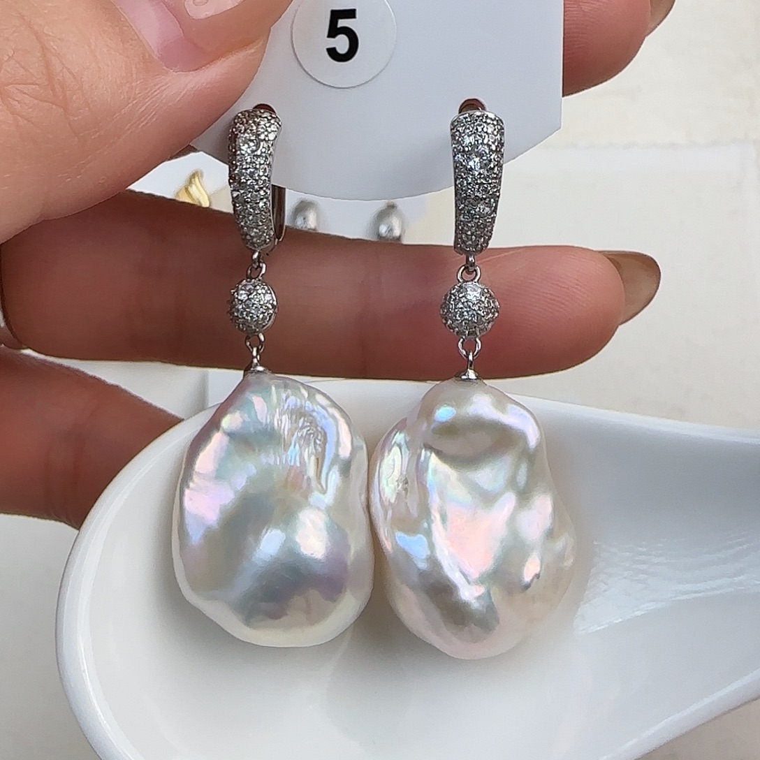 往***零淡水珍珠银S925镶嵌耳饰