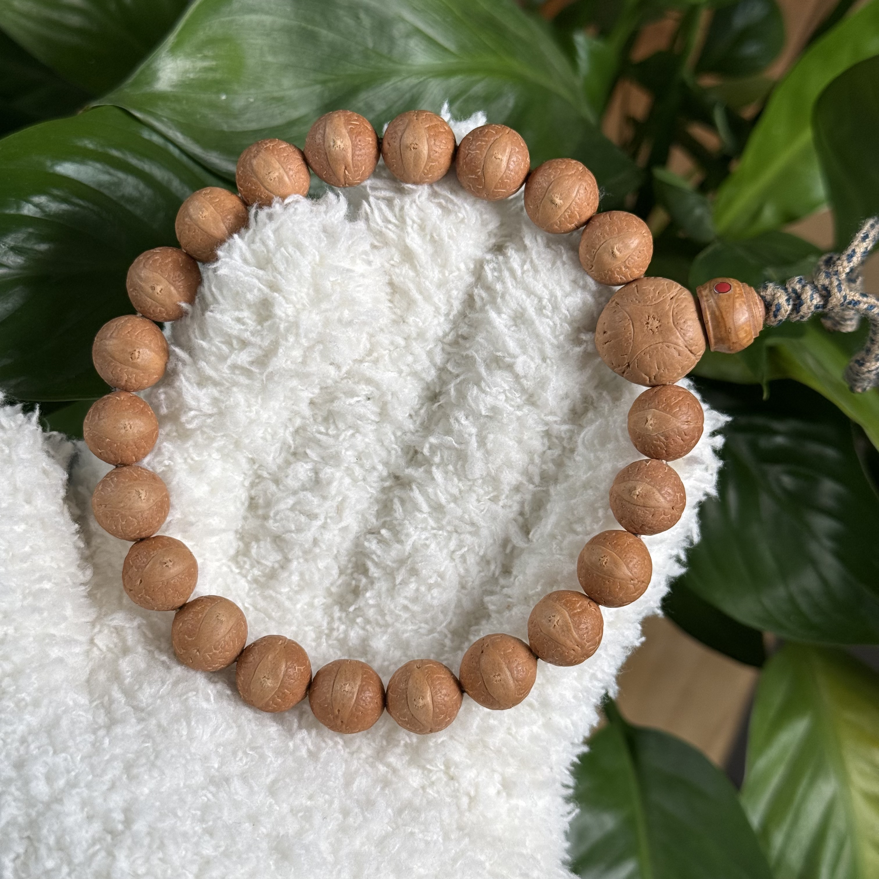 尼泊尔凤眼菩提手串11.5毫米橘黄皮油籽正圆大眼睛