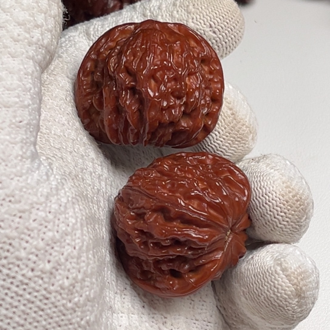 珈***间桃核吊坠文玩核桃链接