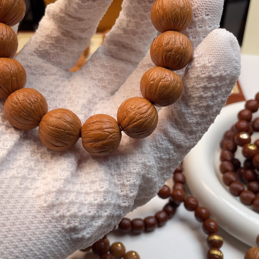 吊坠猴头核桃凤羽