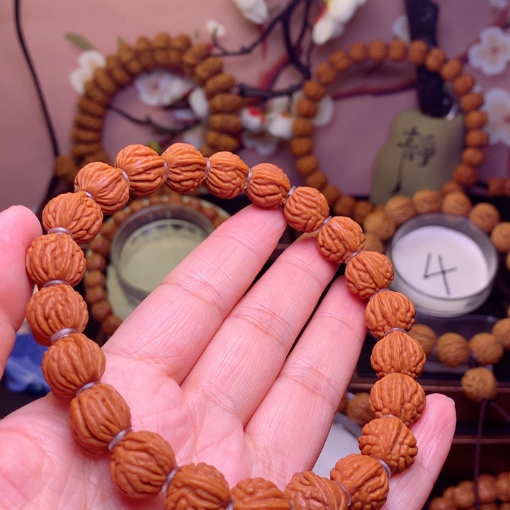 桃核手串铭****n龙纹桃核