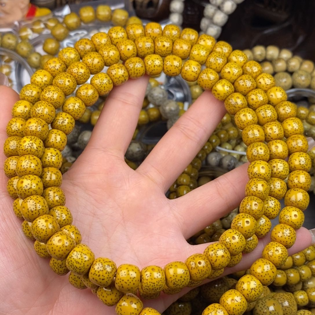 星月菩提吊坠9x10鸡油黄108