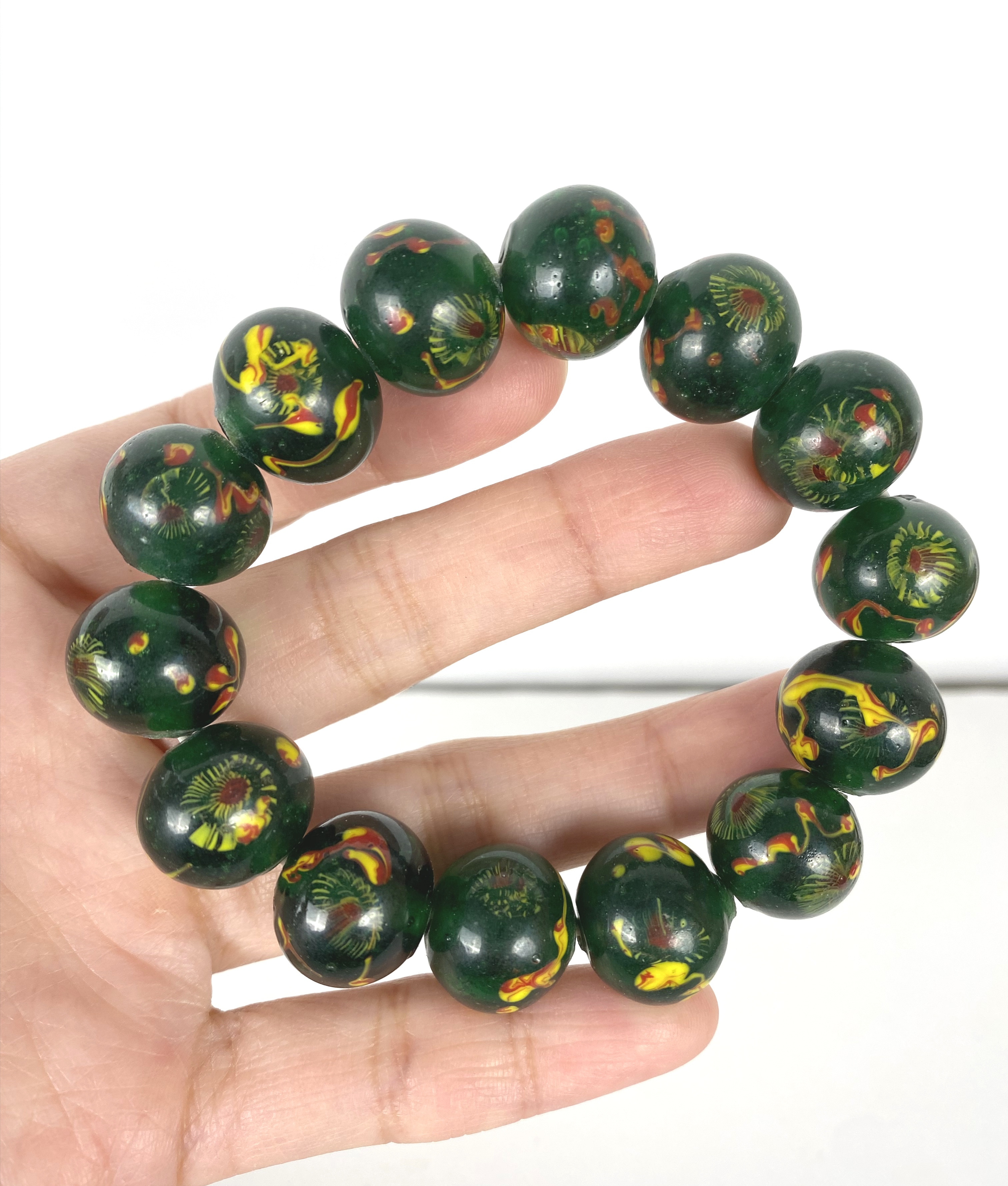 淄博博山大观园老琉璃绿色凤眼手串