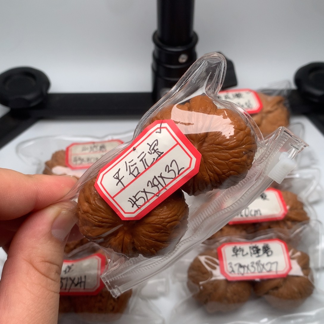 文玩核桃把件突*.元宝