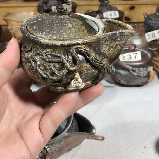 瓷片微瑕的宝瓶悟道