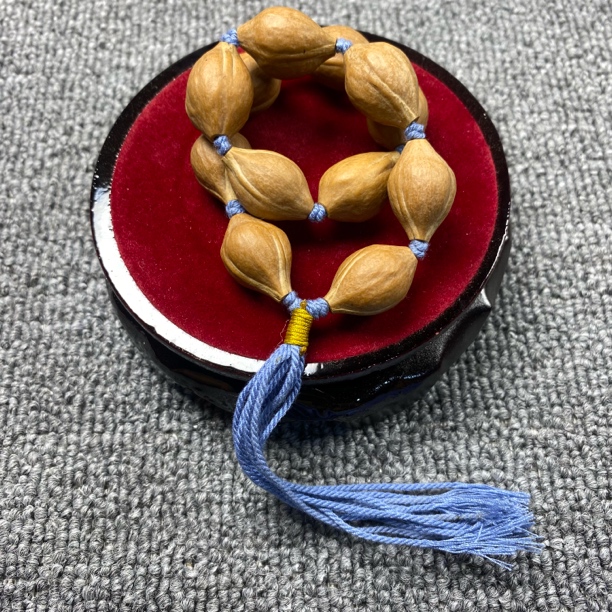 新款橄榄核原皮细长无雕刻素串手持