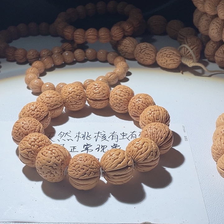 用***7吊坠桃核桃核手串金钱豹39