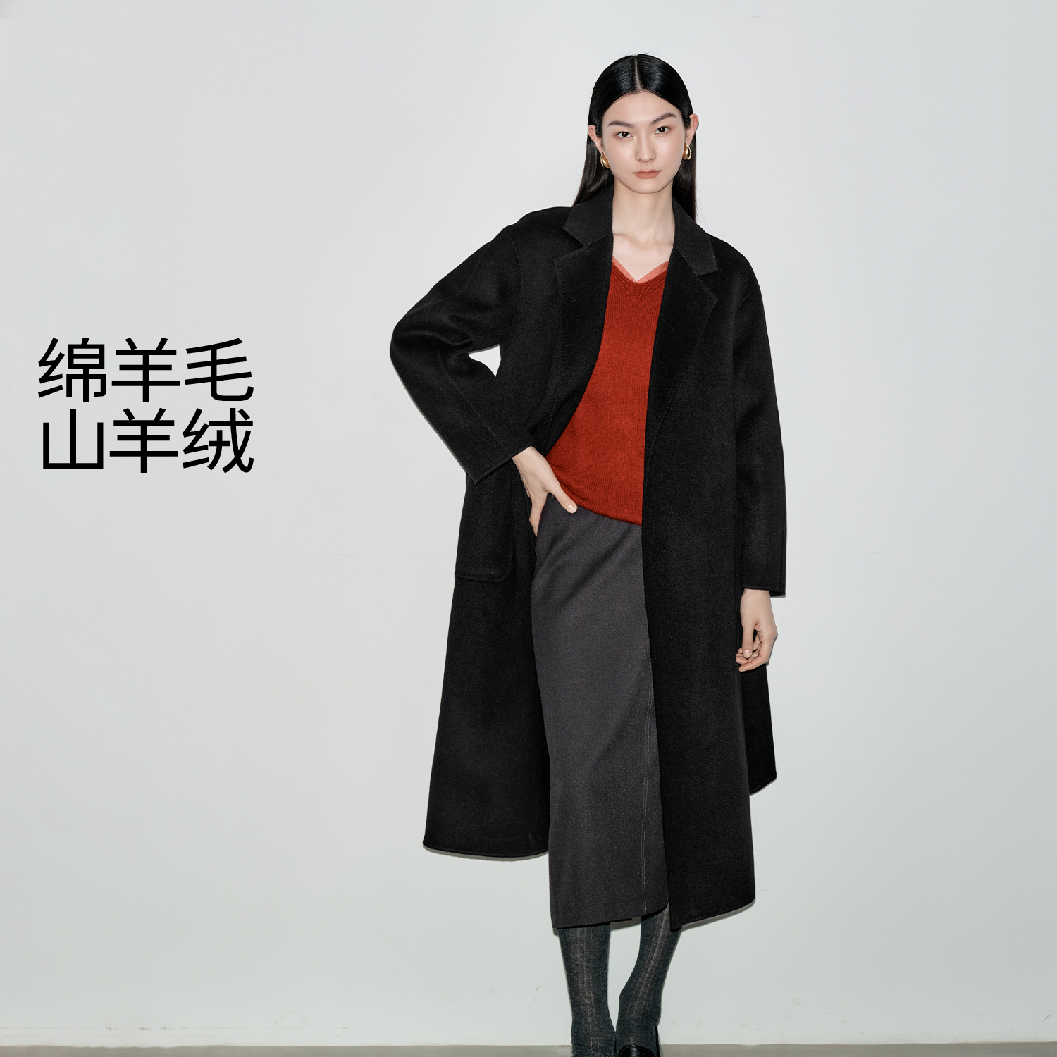 伊芙丽时尚女装设计感收腰长款双面呢黑天鹅毛呢外套新1E9971151