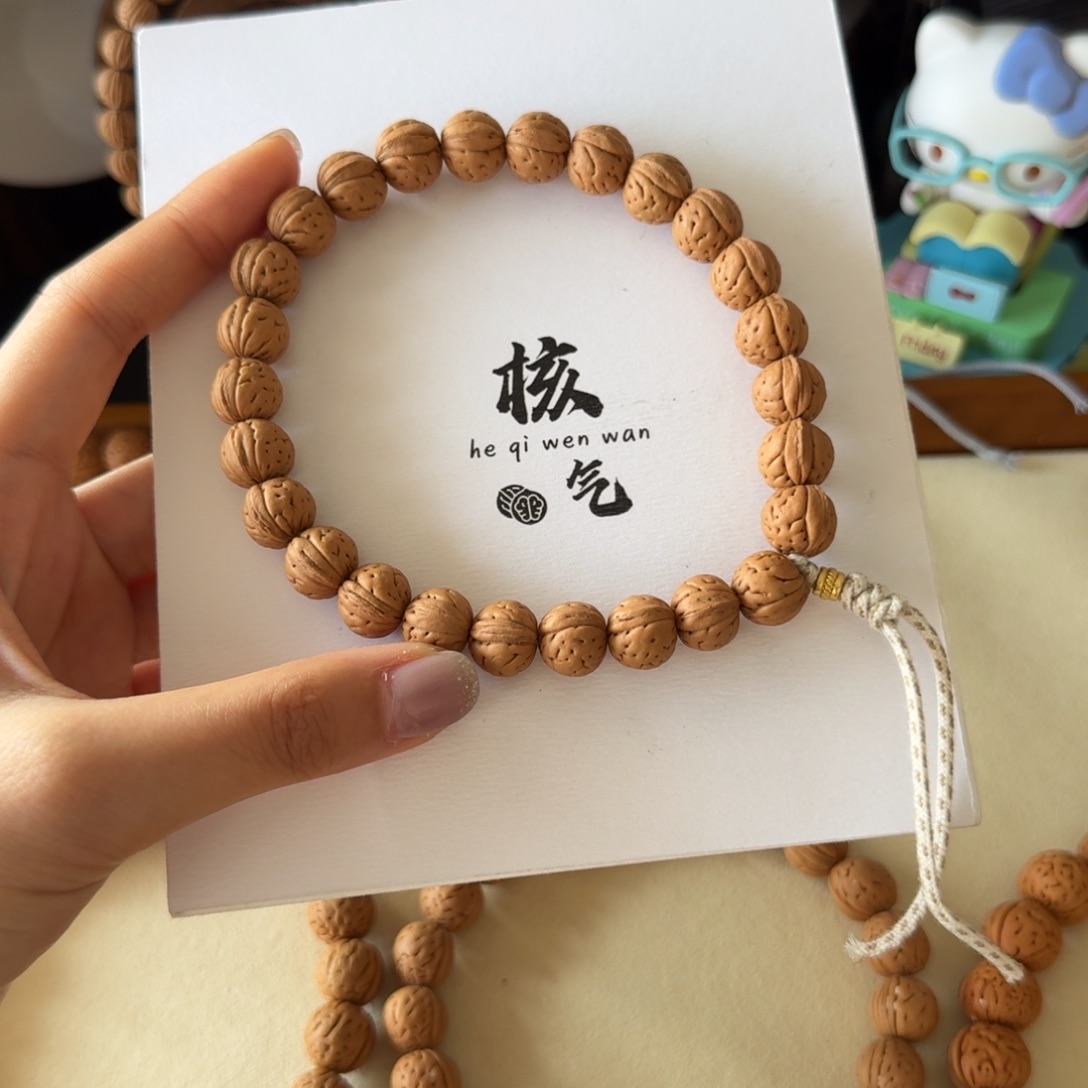 徐***佑12野生矮桩桃核吊坠