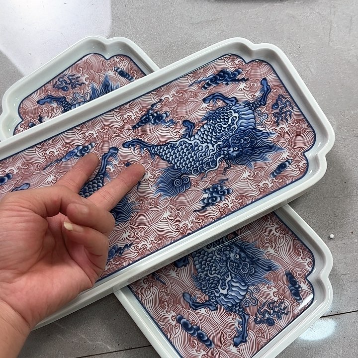 瓷片釉里红麒麟踏浪干泡台